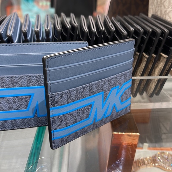 Michael Kors Cooper Graphic Logo Tall Card Case Denim Multi 36S3LCOD2B
NWT - Picture 10 of 16